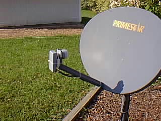 DirecTV LNB strapped to Primestar dish